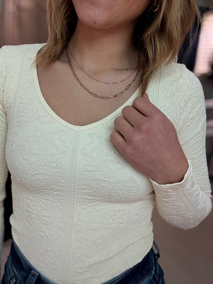 Niki Biki| Lace Textured V Neck Top